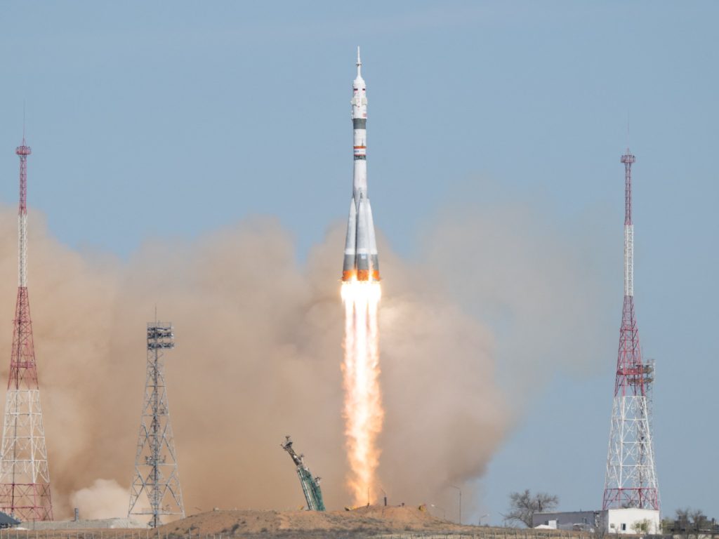 Russian and US crew blasts off in Soyuz rocket bound for ISS | Space News
