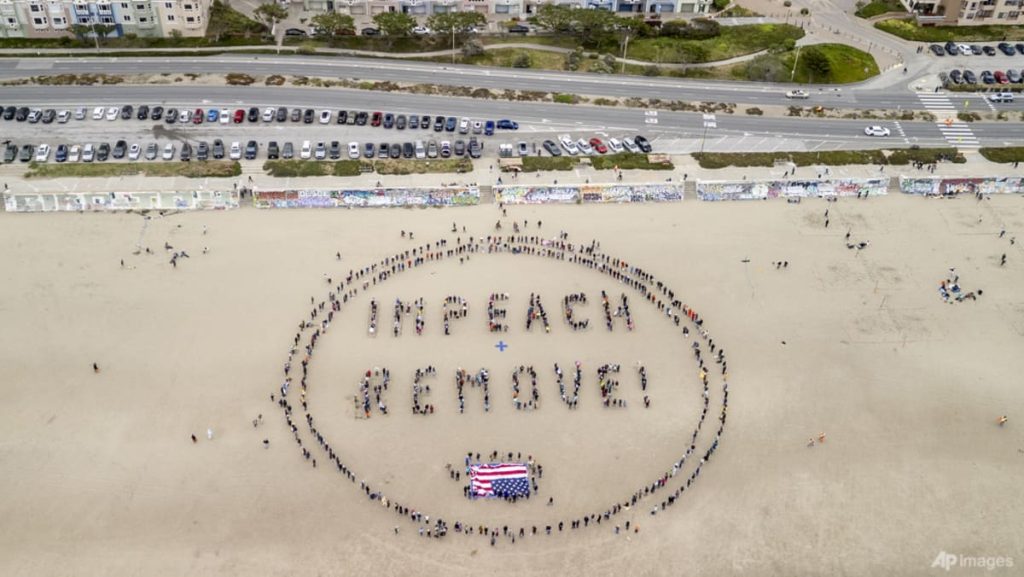 Thousands of protesters rally against Trump across US
