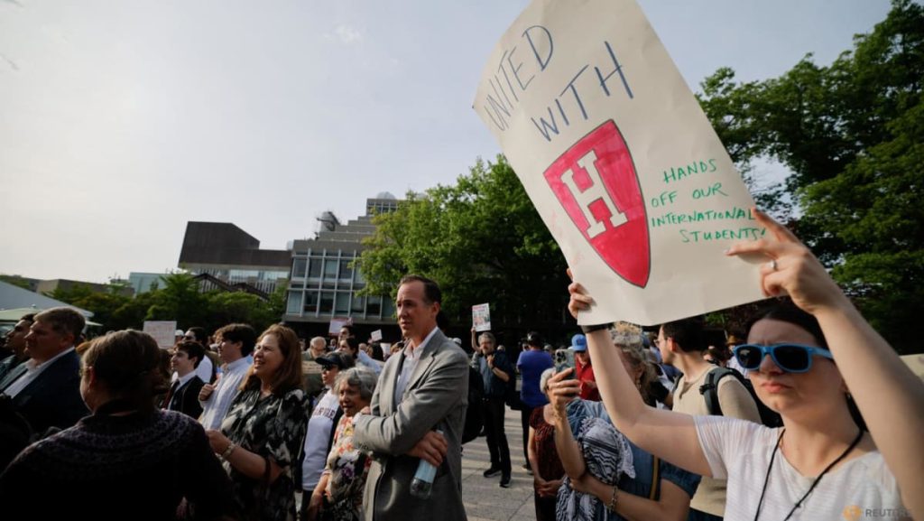 Harvard students march after Trump seeks to cut remaining contracts