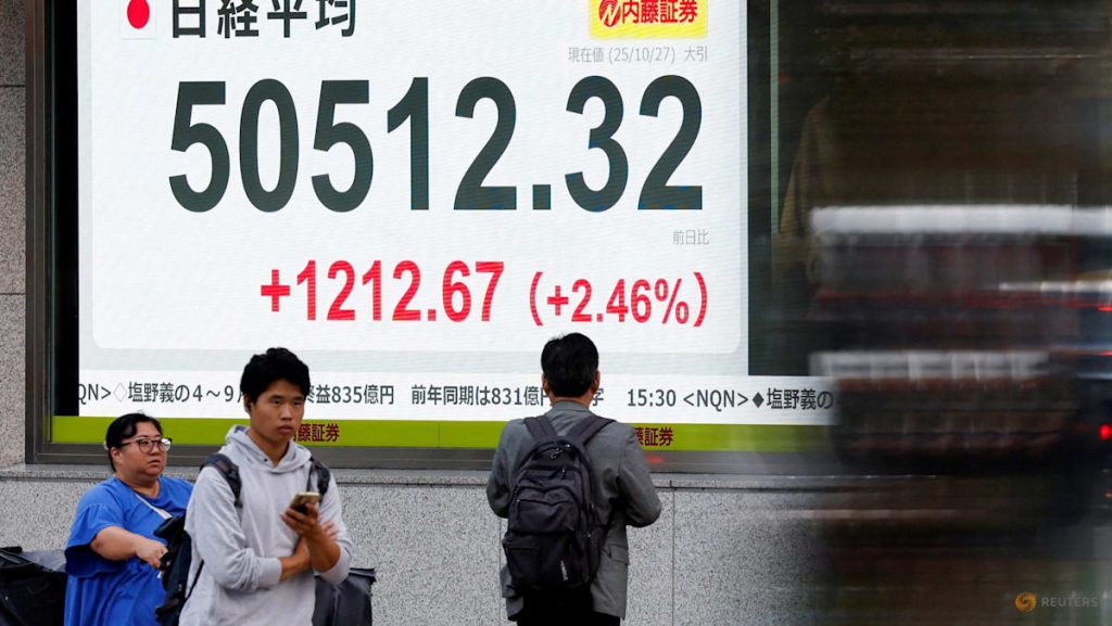Asian markets cool as Trump begins Japan visit