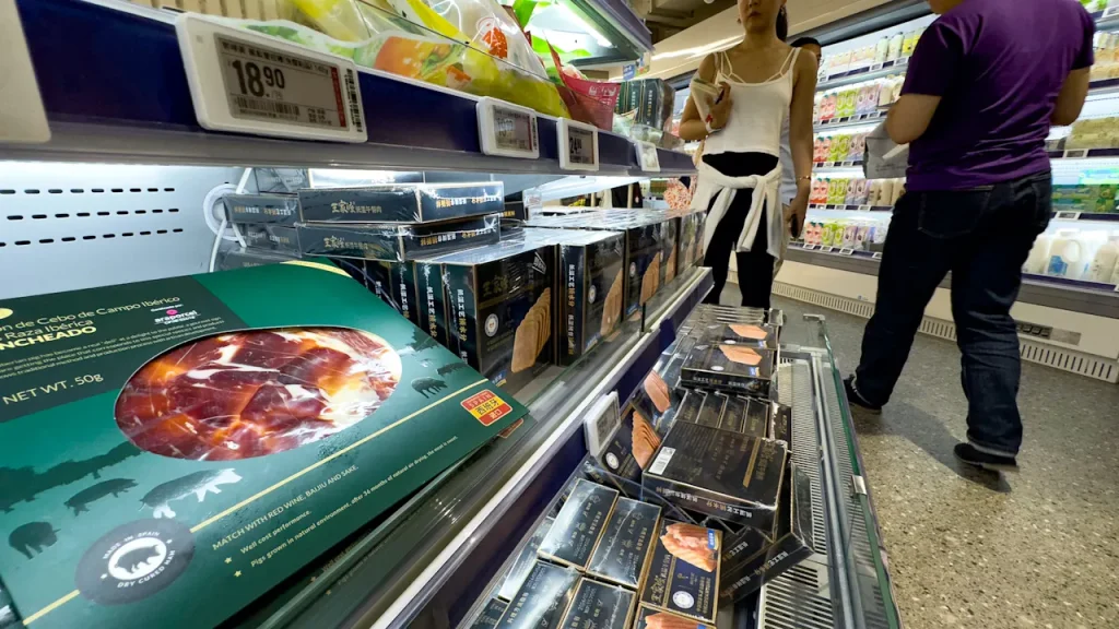 China lowers anti-dumping tariffs on pork imports from the EU